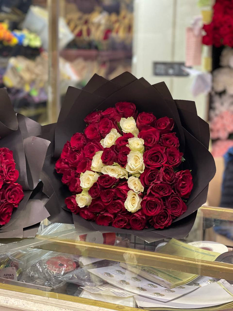 A Rose Initial — statement rose design