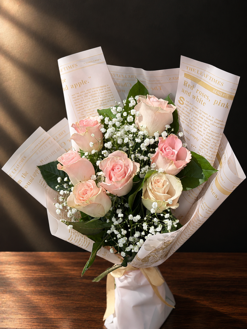 Elegant Pink Rose Bouquet on Vintage Newspaper Wrap